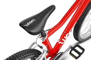 Woom 5 ergonomically formed junior comfort saddle.