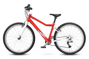 Woom 5 red 24 inch wheel 8 speed ultralight hybrid bike.