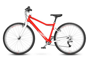 Woom 6 red 26 inch wheel 8 speed ultralight hybrid bike.