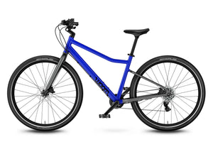 Woom EXPLORE 6 magnetic blue 26 inch wheel 8
-speed ultralight hybrid bike.